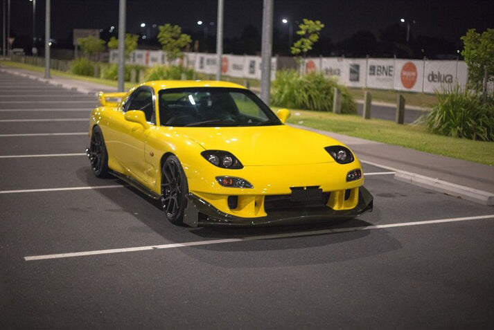 63-887 license plate on the yellow Mazda RX-7 from Japanese Manga Initial D 