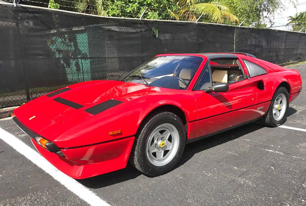 C.U.LATER license plate on Teddy Beckerstead's red Ferrari