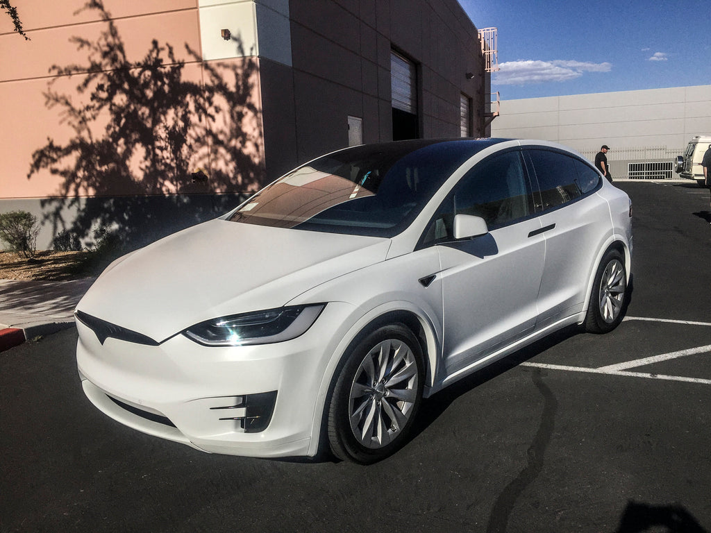 L8RERTH license plate on the Tesla from the 2020 Rocket Launch