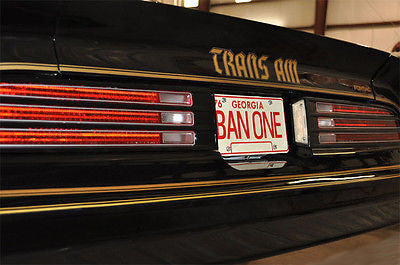 BAN ONE license plate on Burt Reynolds' 1977 Pontiac Trans Am from Smokey and the Bandit